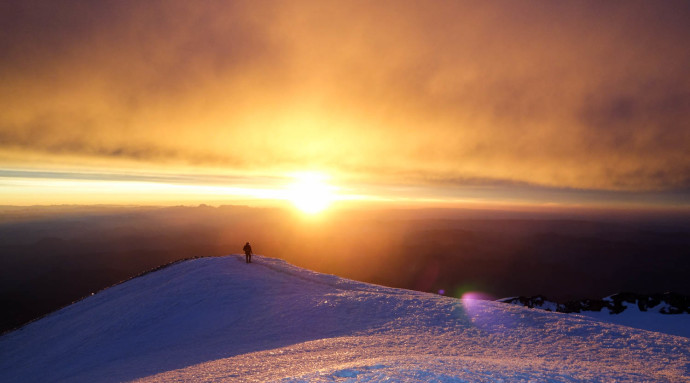 Brad cresting the summit ridge.