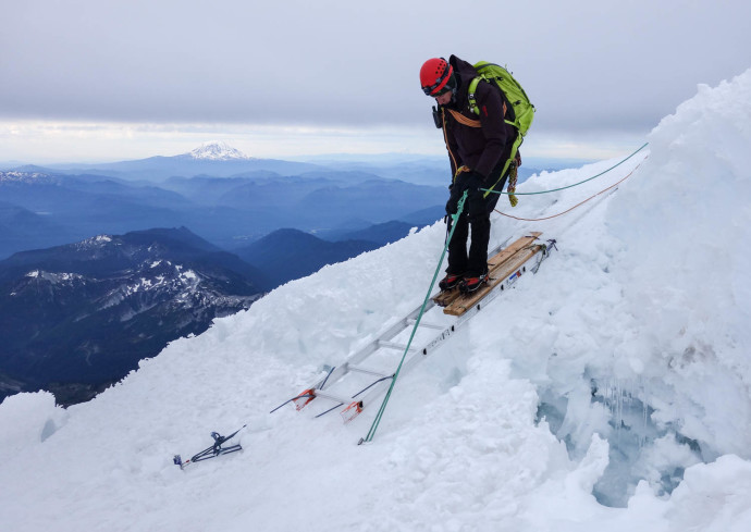 Brad crossing one of the ladders on the route