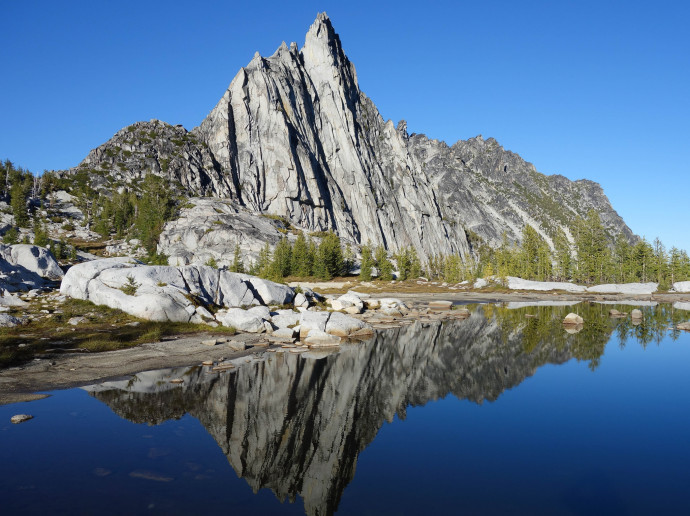 Prussik Peak - Unfinished Business, reflected from the north end of Perfection Lake. 