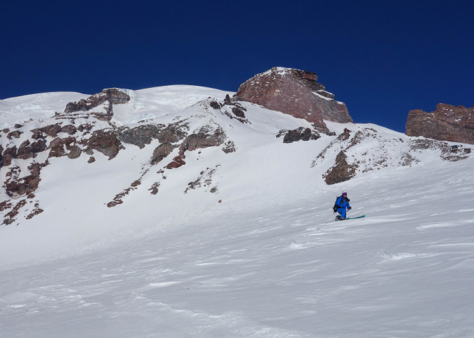 Christian skiing down the Muir Snowfield. 