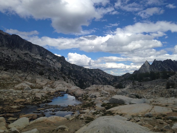The trail weaves between these alpine lakes