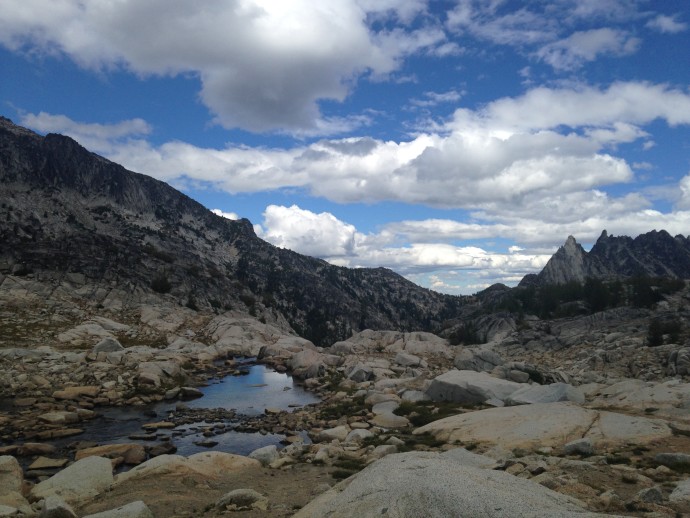 The trail weaves between these alpine lakes