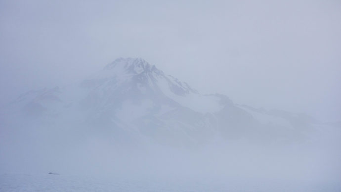 Glacier shaking off the whiteout